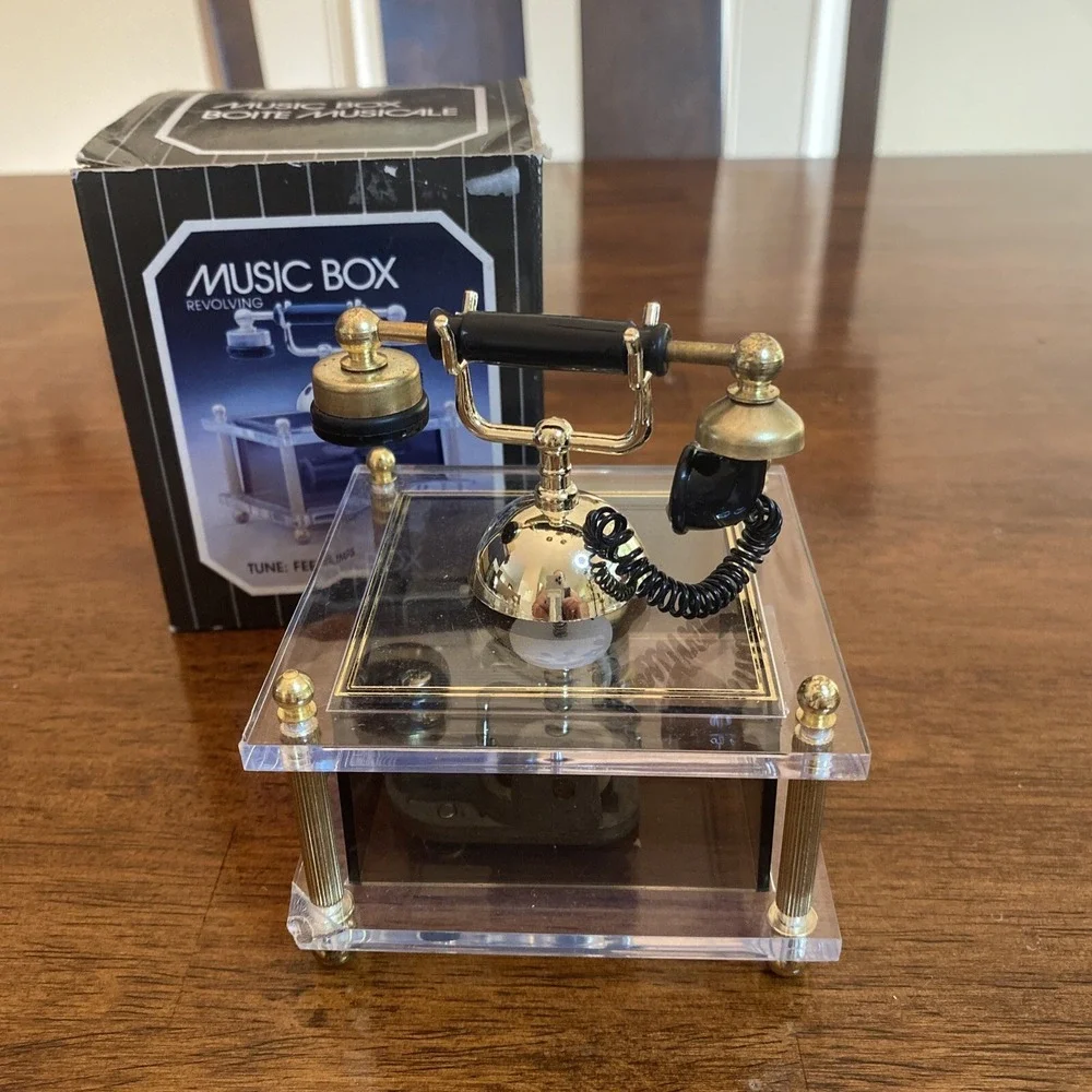 Musical Revolving Telephone With Gold Accents Song (Fillings)